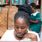 Students reading at the state of arts library